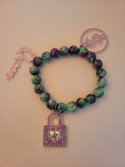 Purple and green with Charms