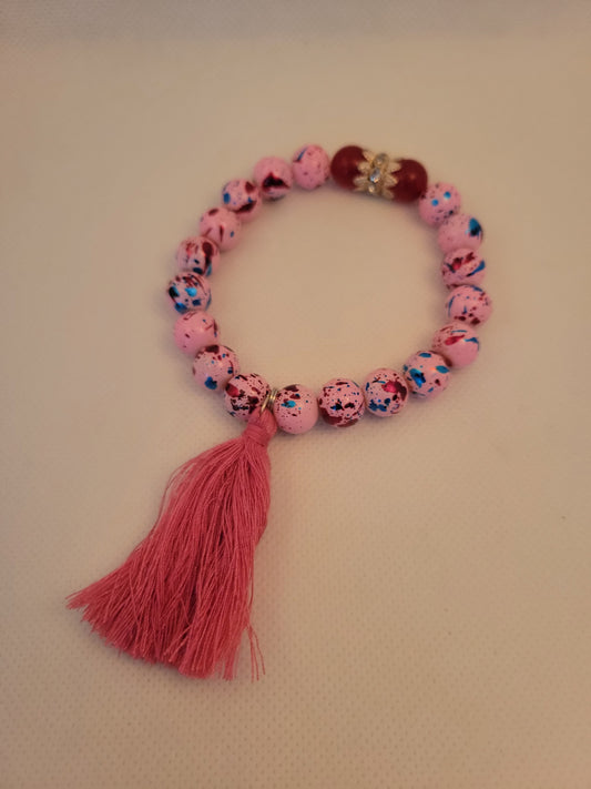 Pink tassle bracelet