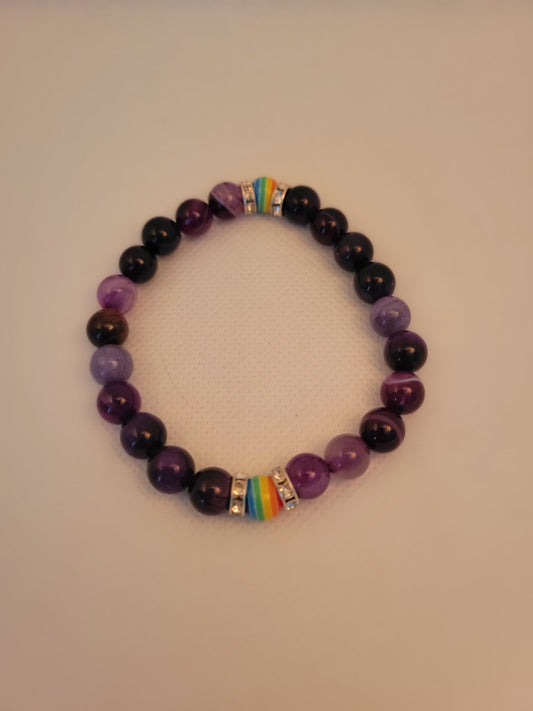 Purple beaded with pride colors bracelet